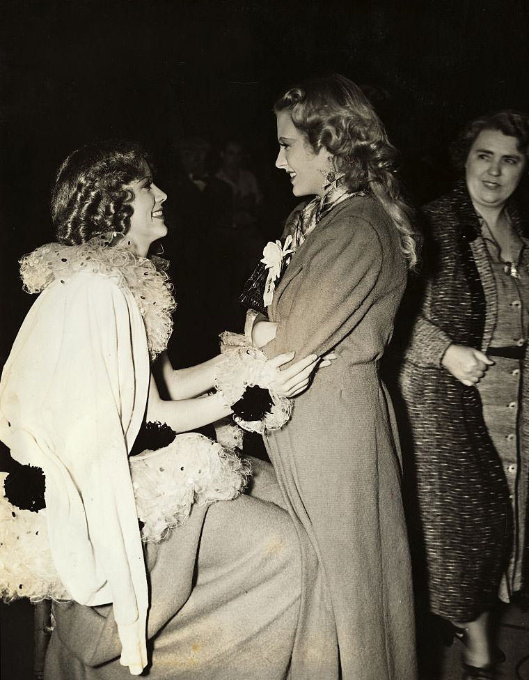 Eleanor Powell talking to Ilona Massey.