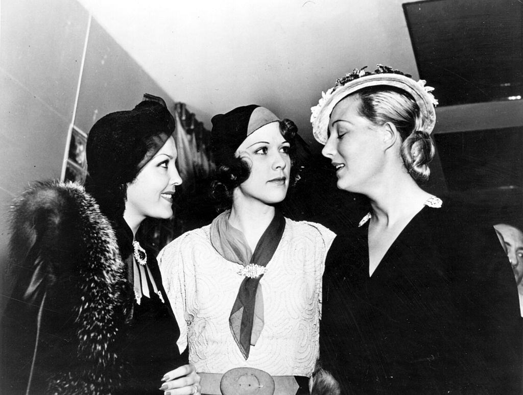 Eleanor Powell with Raquel Torres, and Binnie Barnes, join each other for tea at the Trocadero, 1934.