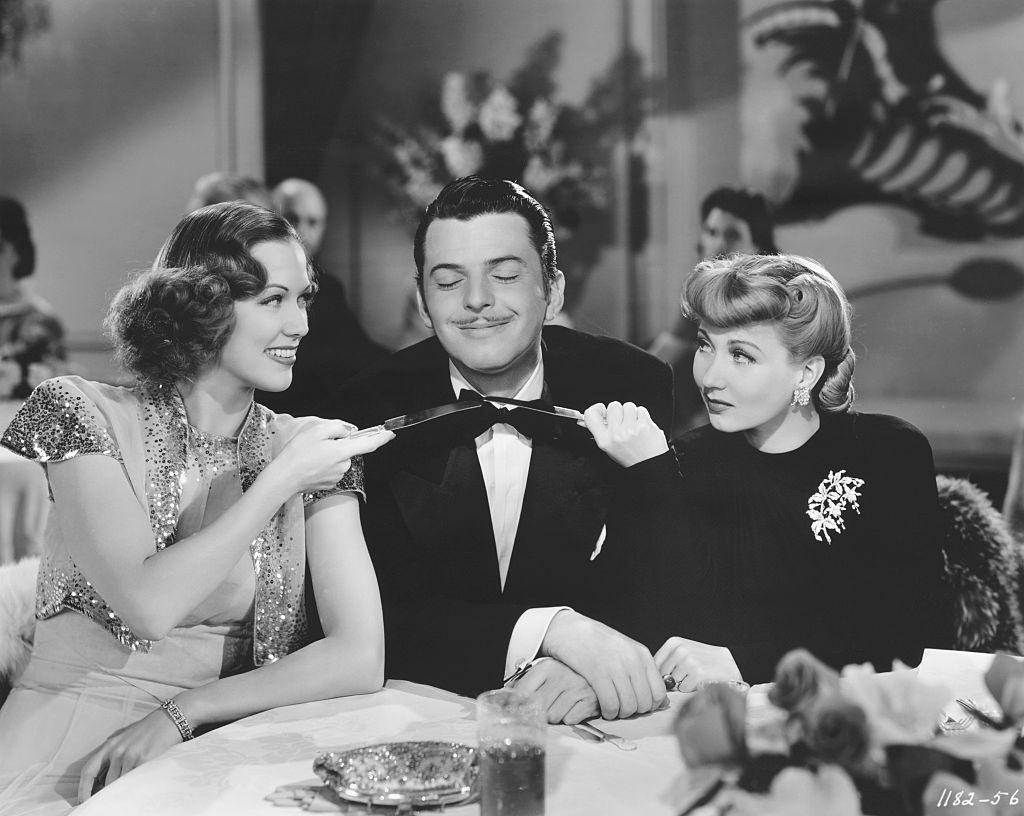 Eleanor Powell with Ann SOrther and Buddy Crawford at the restaurant, 1941.