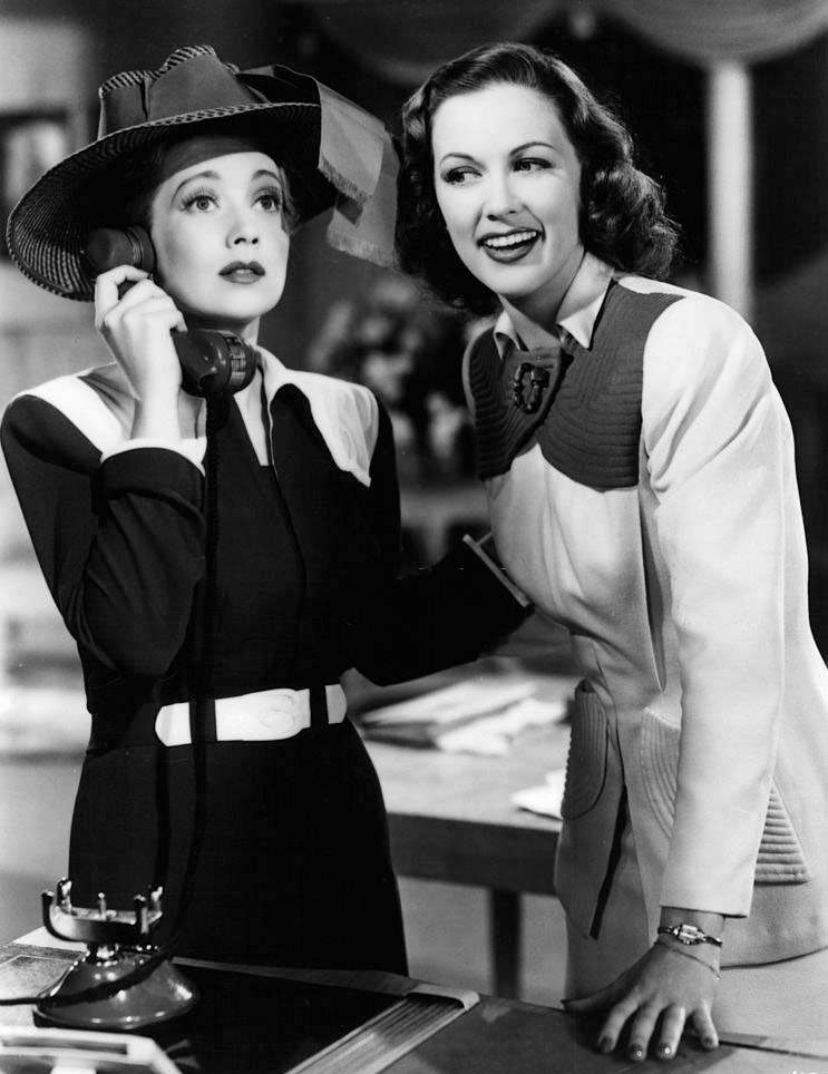 Ann Sothern on the phone while Eleanor Powell listens in a scene from the film 'Lady Be Good', 1941.