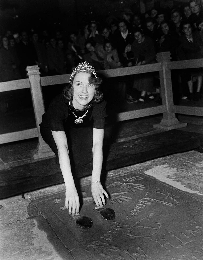 Eleanor Powell has her hands added to cement in front of Grauman's Chinese Theatre in Los Angeles, 1973.