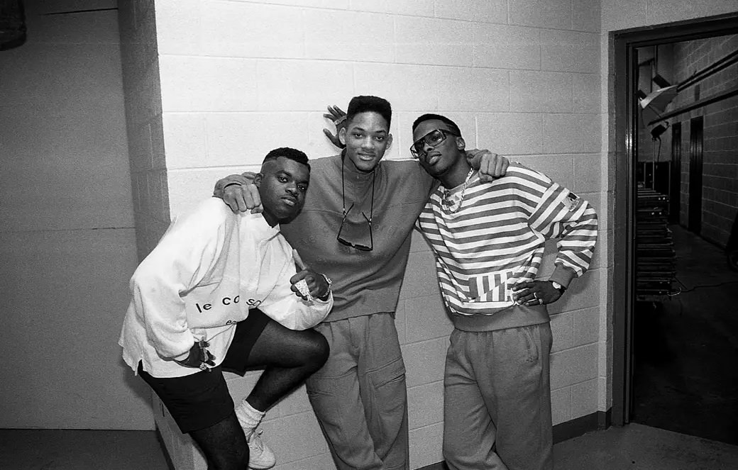 DJ Jazzy Jeff & the Fresh Prince pose for photos with dancer Ready Rock C backstage at the UIC Pavilion in Chicago in July 1988.