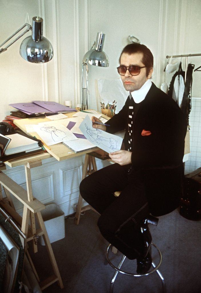 Karl Lagerfeld sits at his desk in 1979.