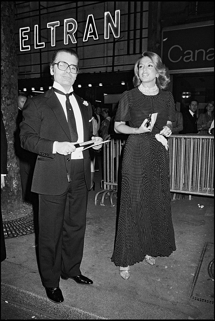 Karl Lagerfeld with Ira De Furstenberg attend the concert of Lola Beltran in 1979.