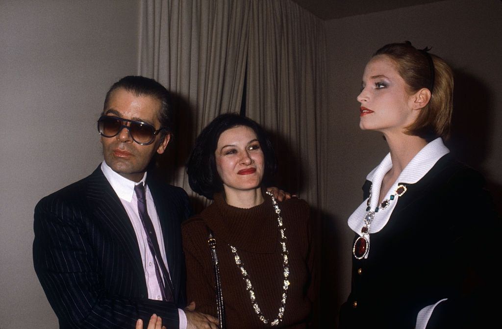 Karl Lagerfeld with designer Paloma Picasso and a fashion model at the Chanel Spring-Summer 1983.