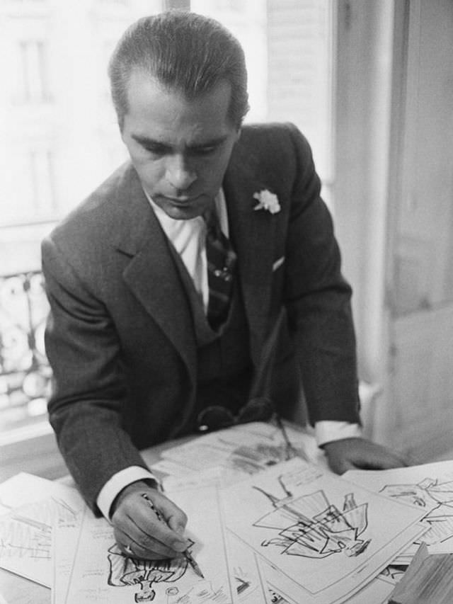Karl Lagerfeld desigining his designs, 1950s.