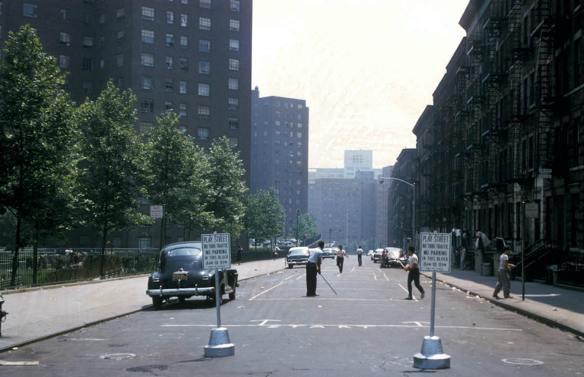 New York, Manhattan, designated children’s play street with residential buildings – 1956