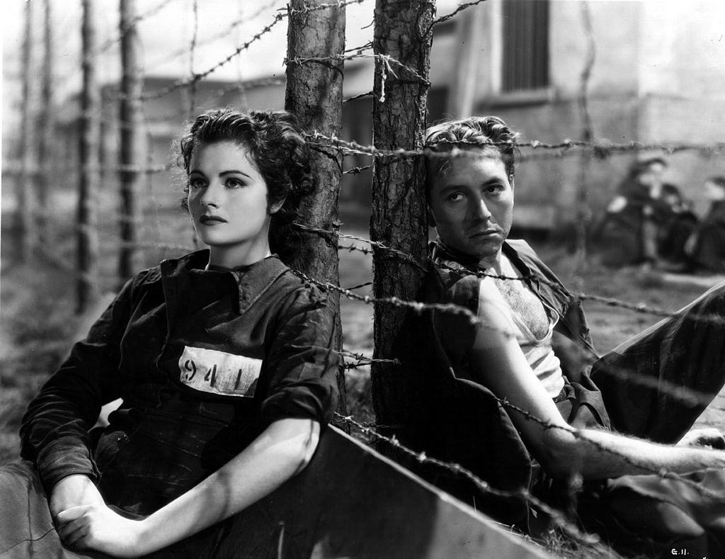 Margaret Lockwood as a prisoner-of-war with Paul Henreid in the movie 'Gestapo', 1940.