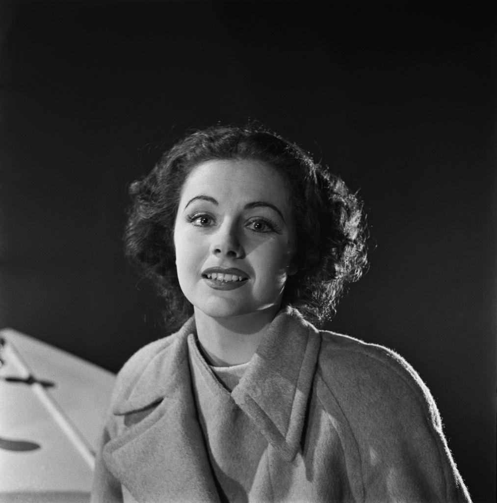 Margaret Lockwood dressed in character as Anna Bomasch, during the shooting of a scene from the war thriller film 'Night Train to Munich', 1940.