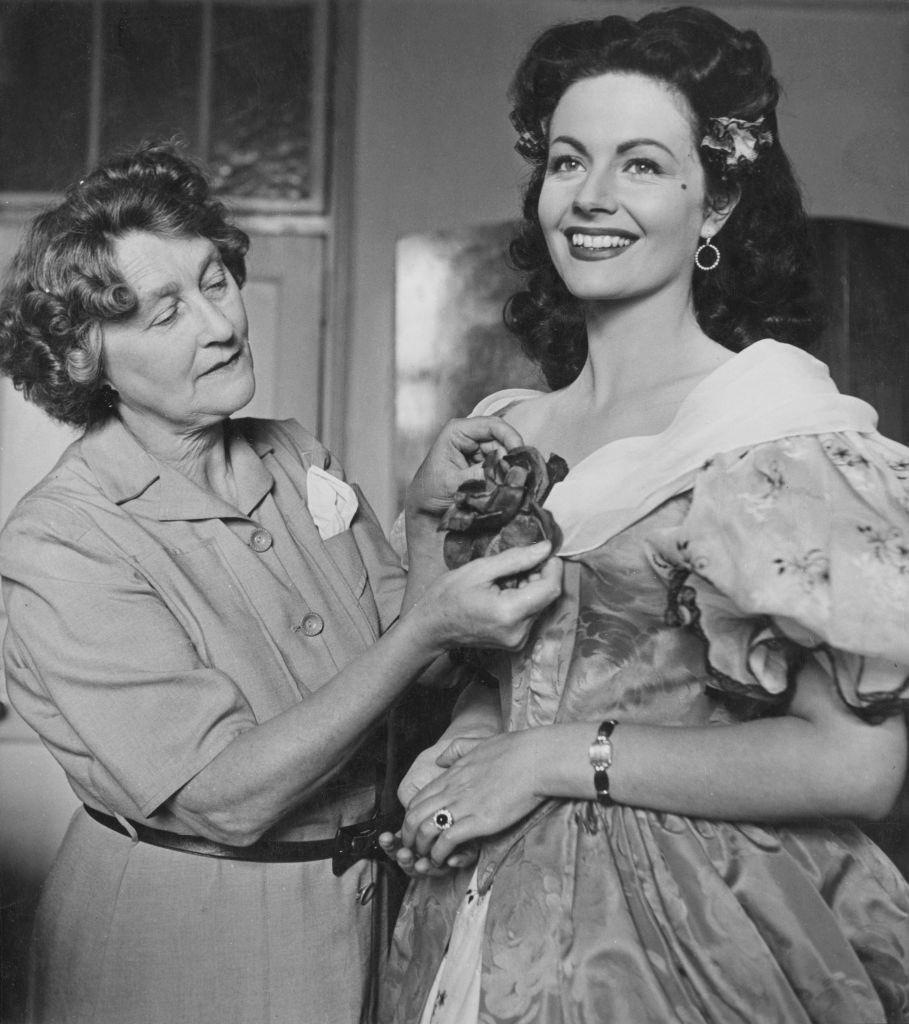 Margaret Lockwood is fitted for her costume in the film 'The Wicked Lady', August 1946.