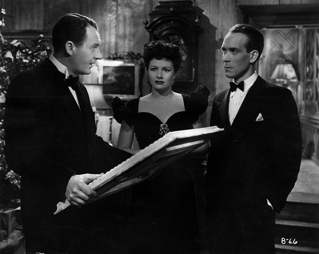 Margaret Lockwood with Ian Hunter and Barry K Barnes in the movie 'Bedelia', 1946.