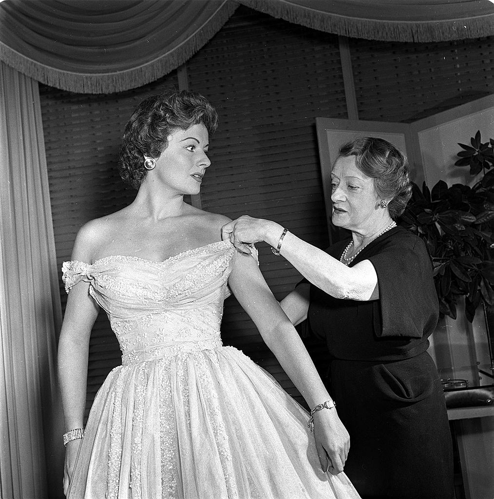 Margaret Lockwood wearing a new gown for the Royal Command Performance, 1950.