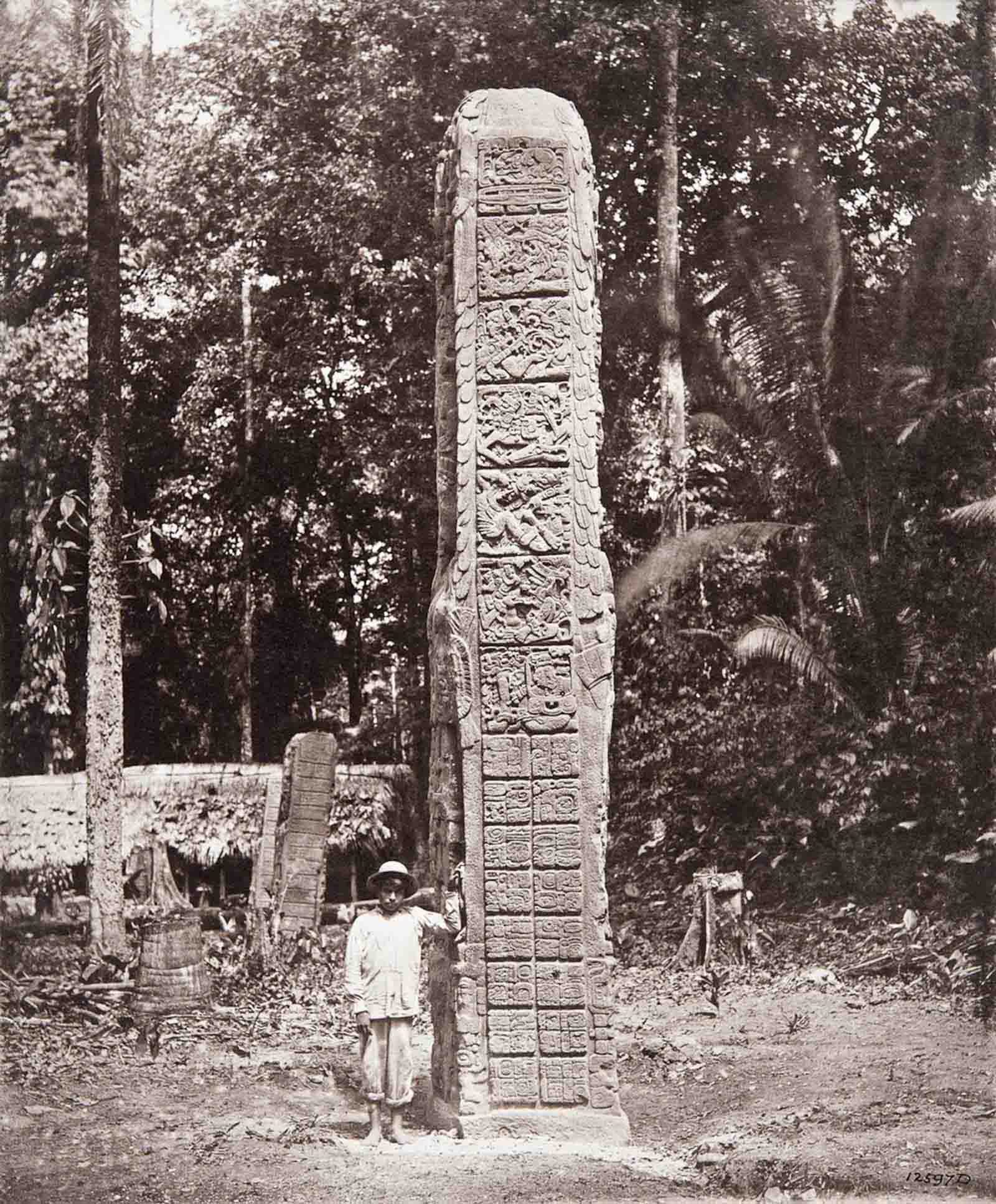 Stela D (also known as Monument 4), dated AD 766. “The inscription on each side of the Stela is headed by an initial series of six squares of picture-writing”, Alfred Maudslay noted of this monument.