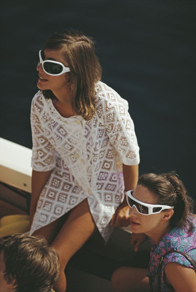 Princess Margaret, Countess of Snowdon, wearing futuristic style sunglasses, on the Aga Khan's yacht, Costa Smeralda, Sardinia, Italy, August 1967