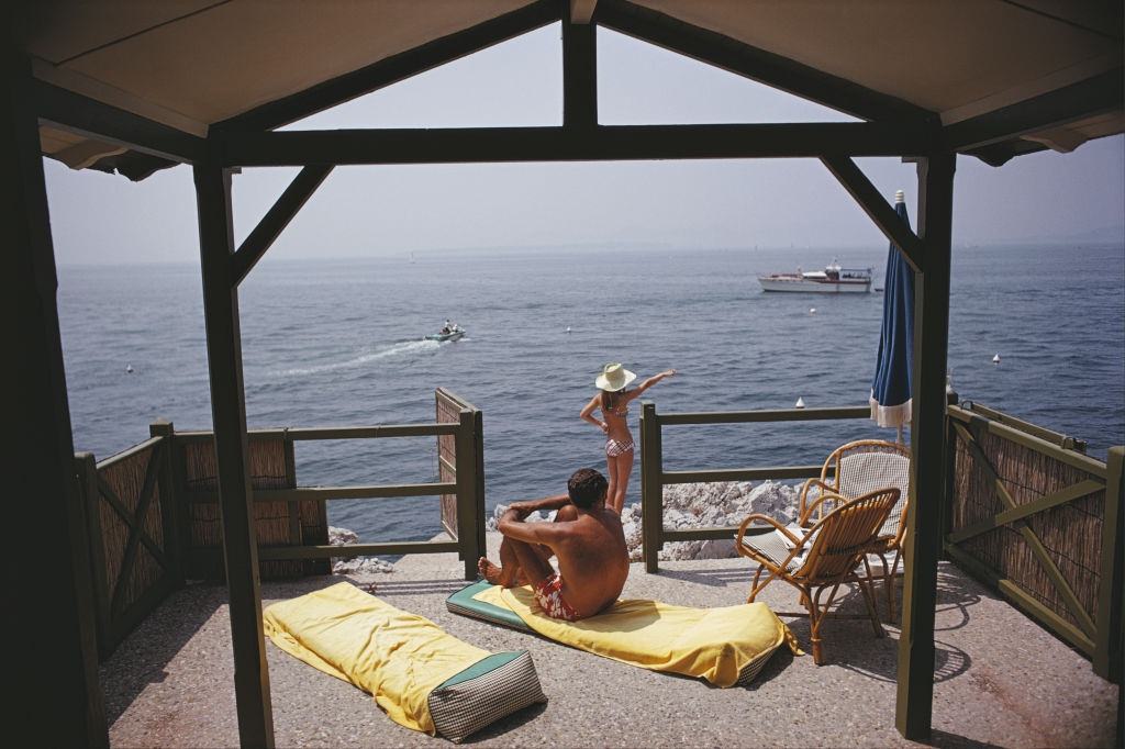 Guests at a beach hut at the Hotel du Cap-Eden-Roc in Antibes on the French Riviera, August 1969