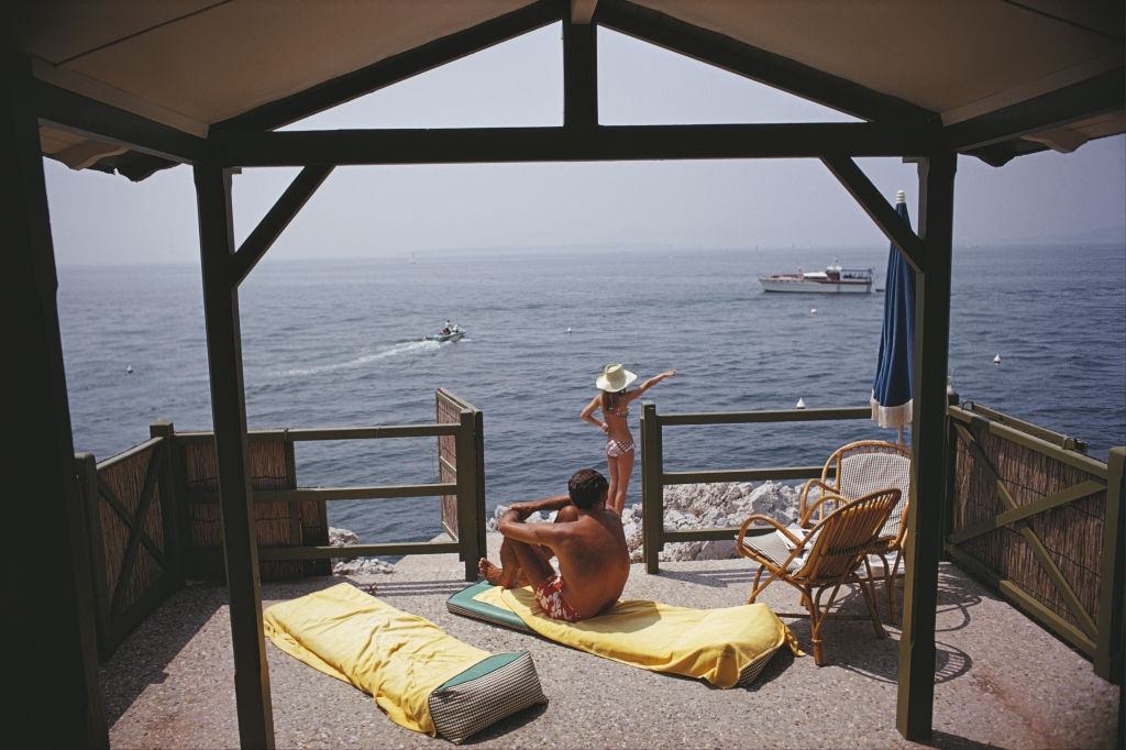 Guests at a beach hut at the Hotel du Cap-Eden-Roc in Antibes on the French Riviera, August 1969