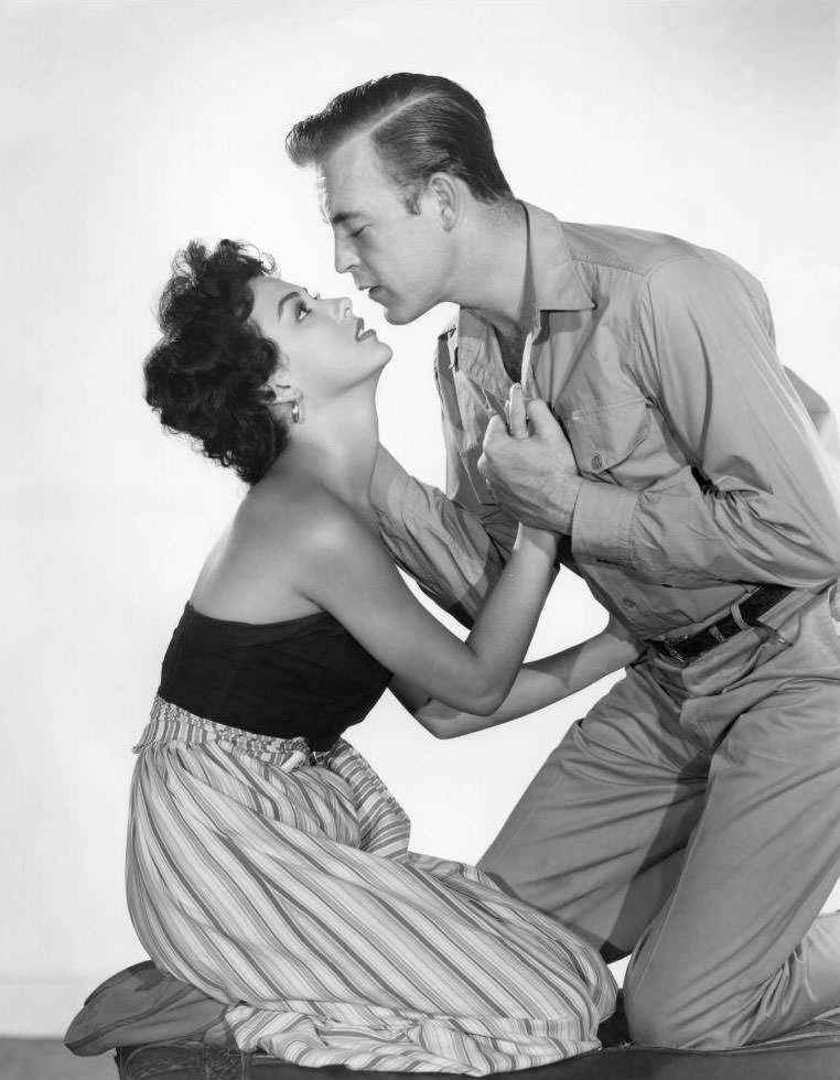 Rita Moreno and Scott Brady in 'El Alamein', 1953.