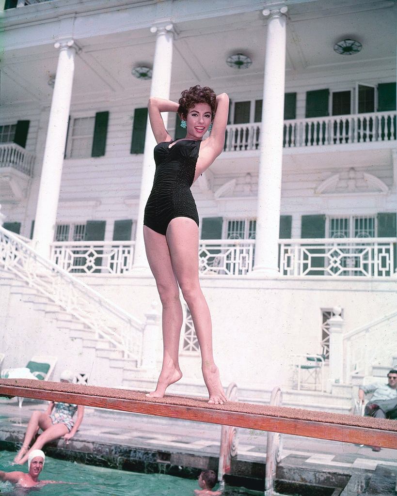Rita Moreno in black swimsuit, 1955.