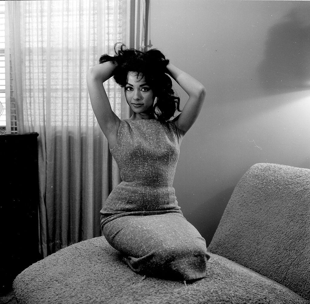 Rita Moreno poses at home in Los Angeles, 1957.