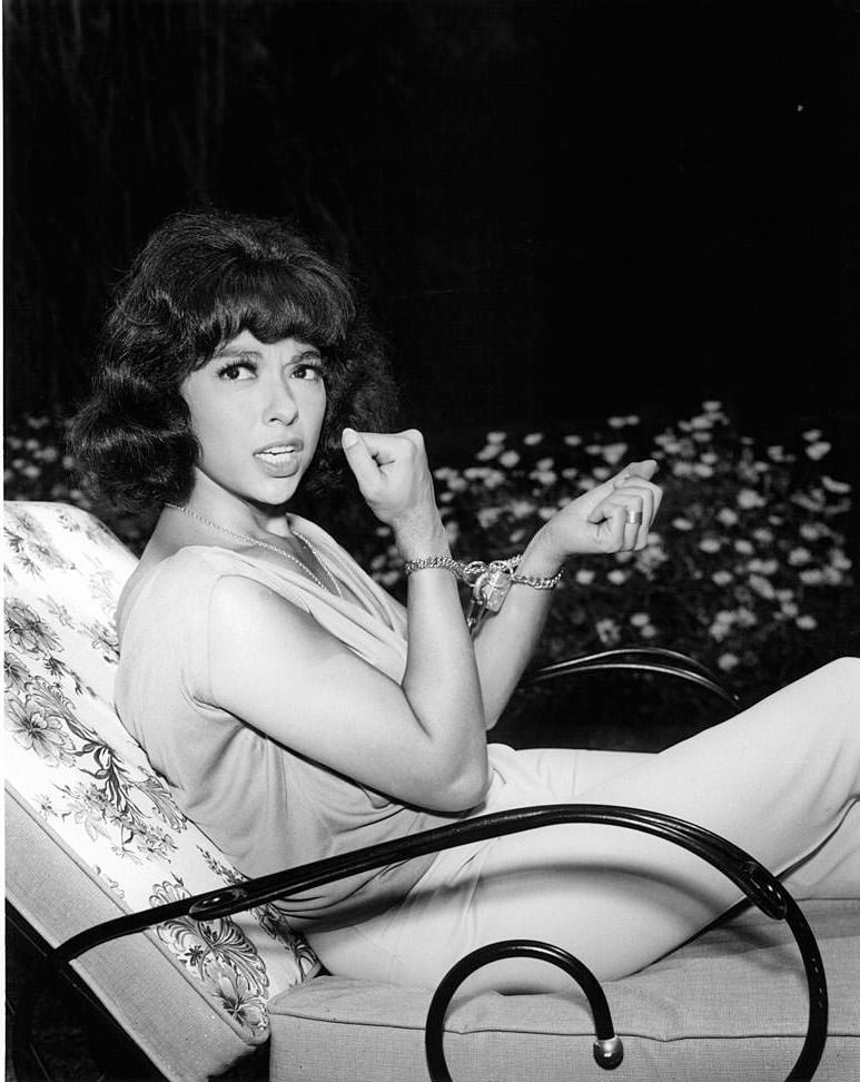 Rita Moreno in handcuffs in a scene from the television series 'Burke's Law', 1963