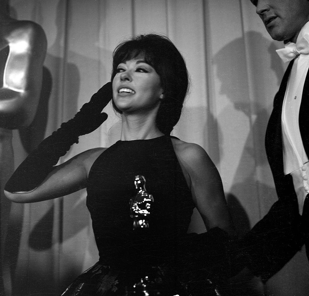 Rita Moreno holds her Oscar during the Academy Awards after winning for 'West Side Story' in Los Angeles, 1962.