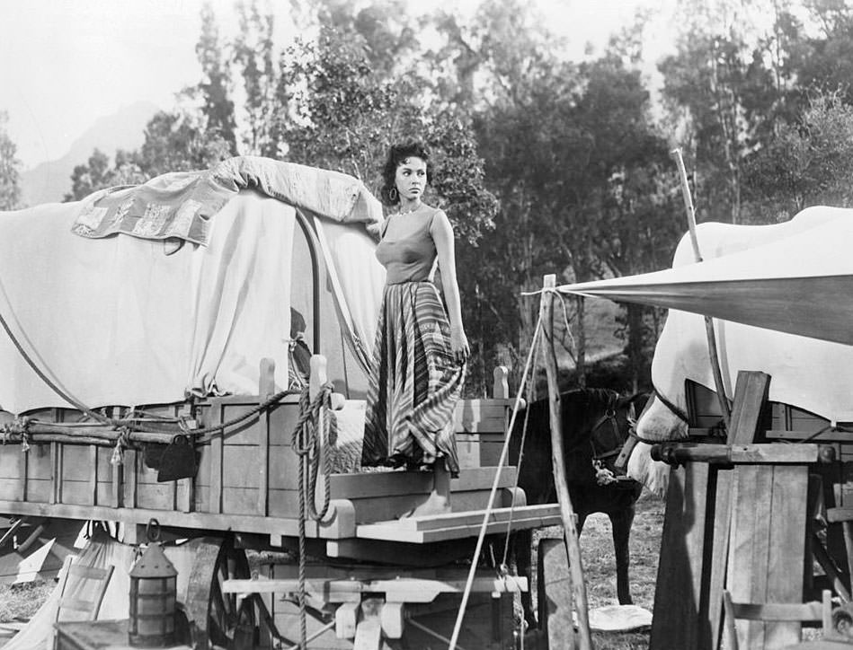 Rita Moreno looking to her left outside in a scene from the film 'Garden Of Evil', 1954.