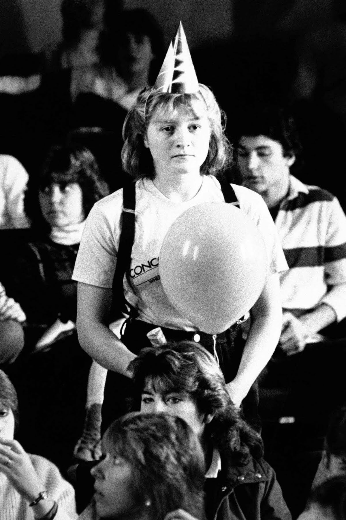 Concord High School student Carina Dolcino stands in stunned silence after watching the live broadcast of the launch at a school assembly.