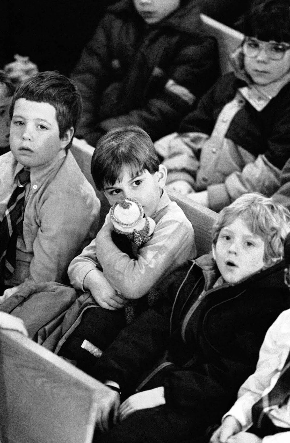 Children attend a memorial service for Christa McAuliffe at a church in Concord, New Hampshire.