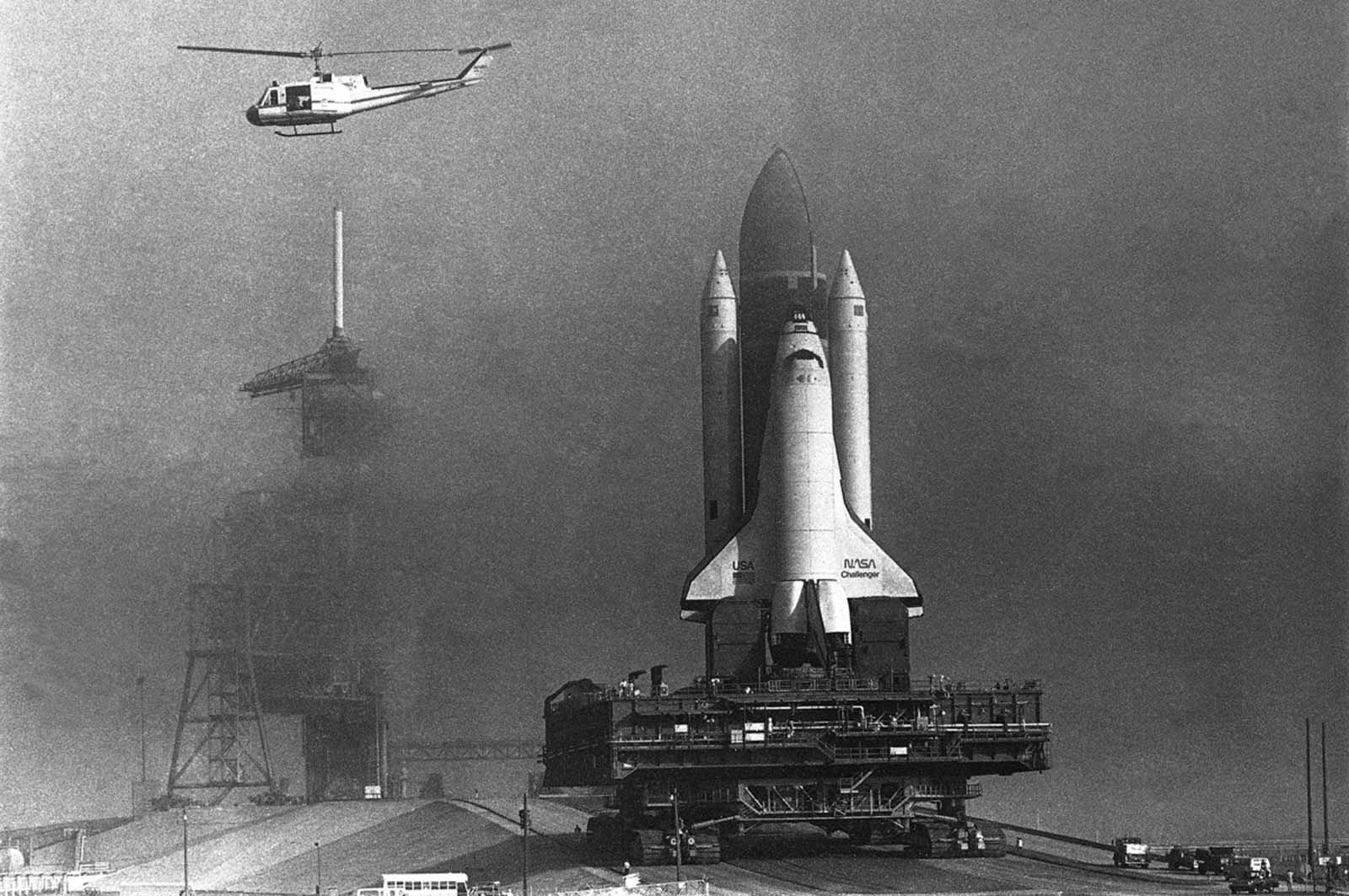 The space shuttle Challenger rolls toward the launch pad at Kennedy Space Center before its first flight on April 4, 1983. Nov. 30, 1982.