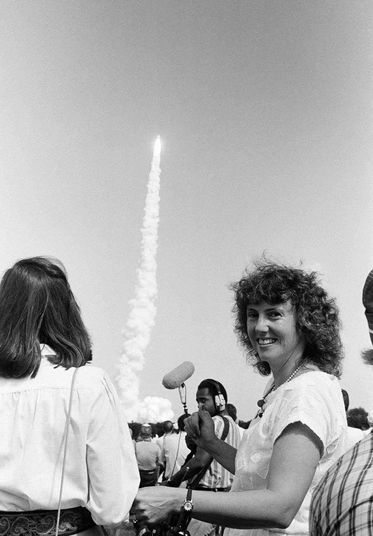 Christa McAuliffe watches a successful launch of the space shuttle Challenger after being selected to join a later mission. Oct. 30, 1985.
