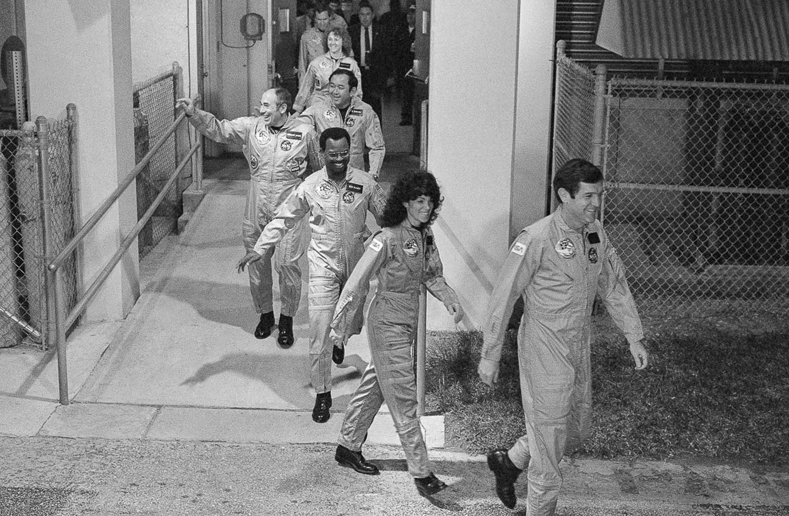 The crew of the Challenger leave their quarters on their way to the launch pad. Jan. 27, 1986.