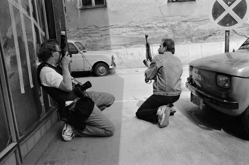 American photographer David Turnley documents street fighting during the siege of Sarajevo, 1992.