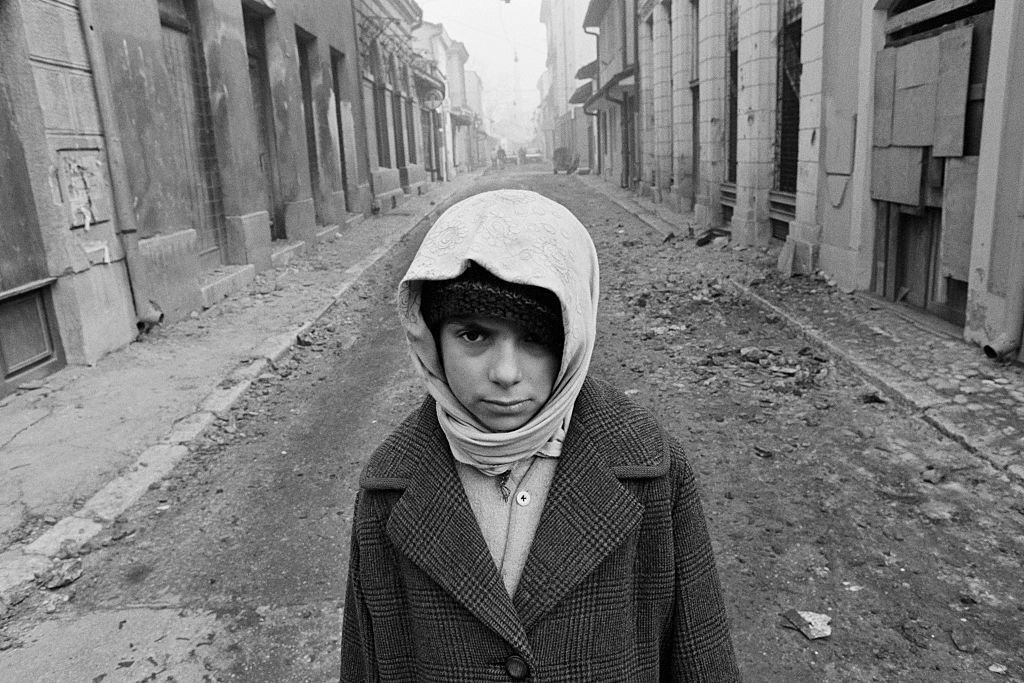 Mirza Mangajic, a 10-year-old Muslim boy, survives in Sarajevo's Old Town quarter with his grandmother, 1993.