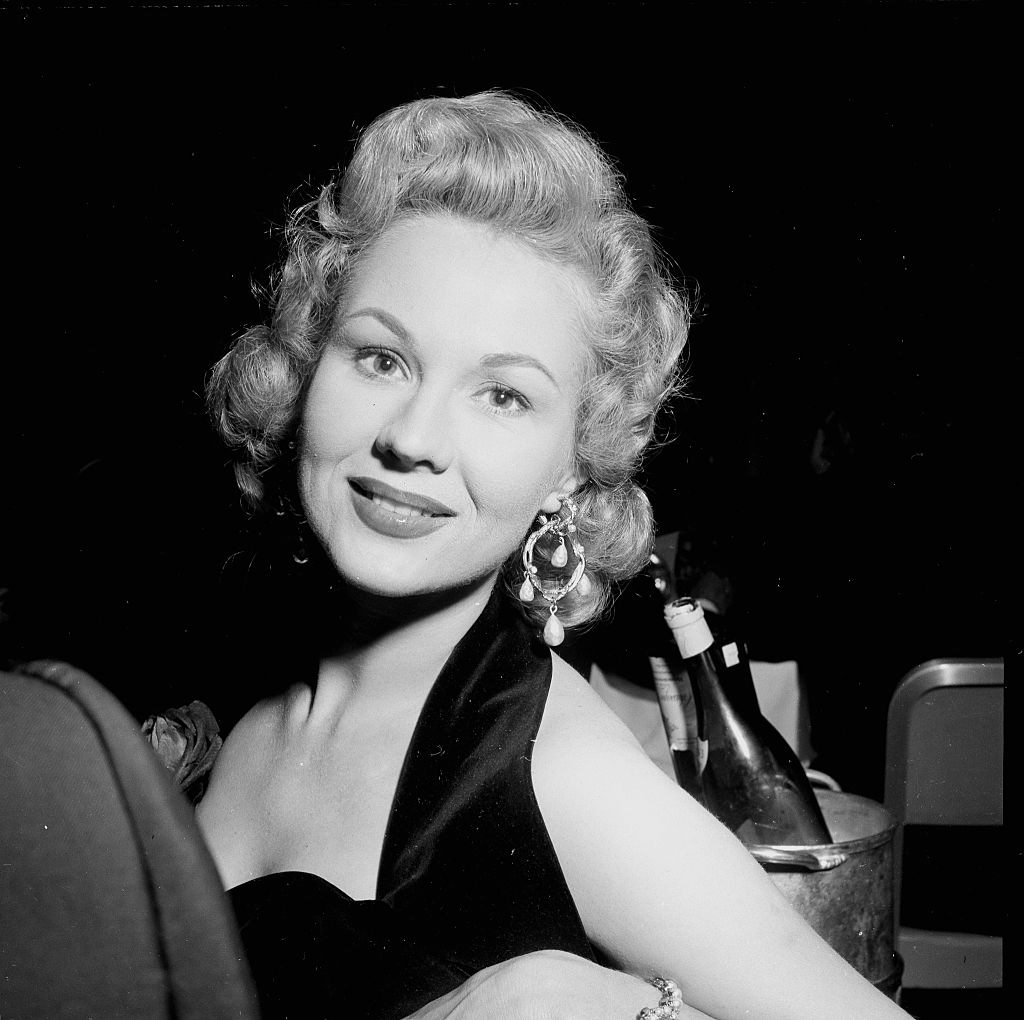 Virginia Mayo poses at a party in Los Angeles, 1954.