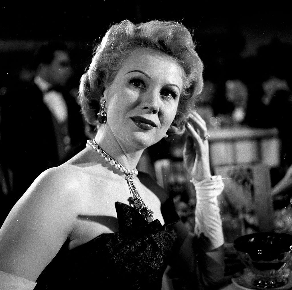 Virginia Mayo attends the Emmy Awards in Los Angeles,1955.
