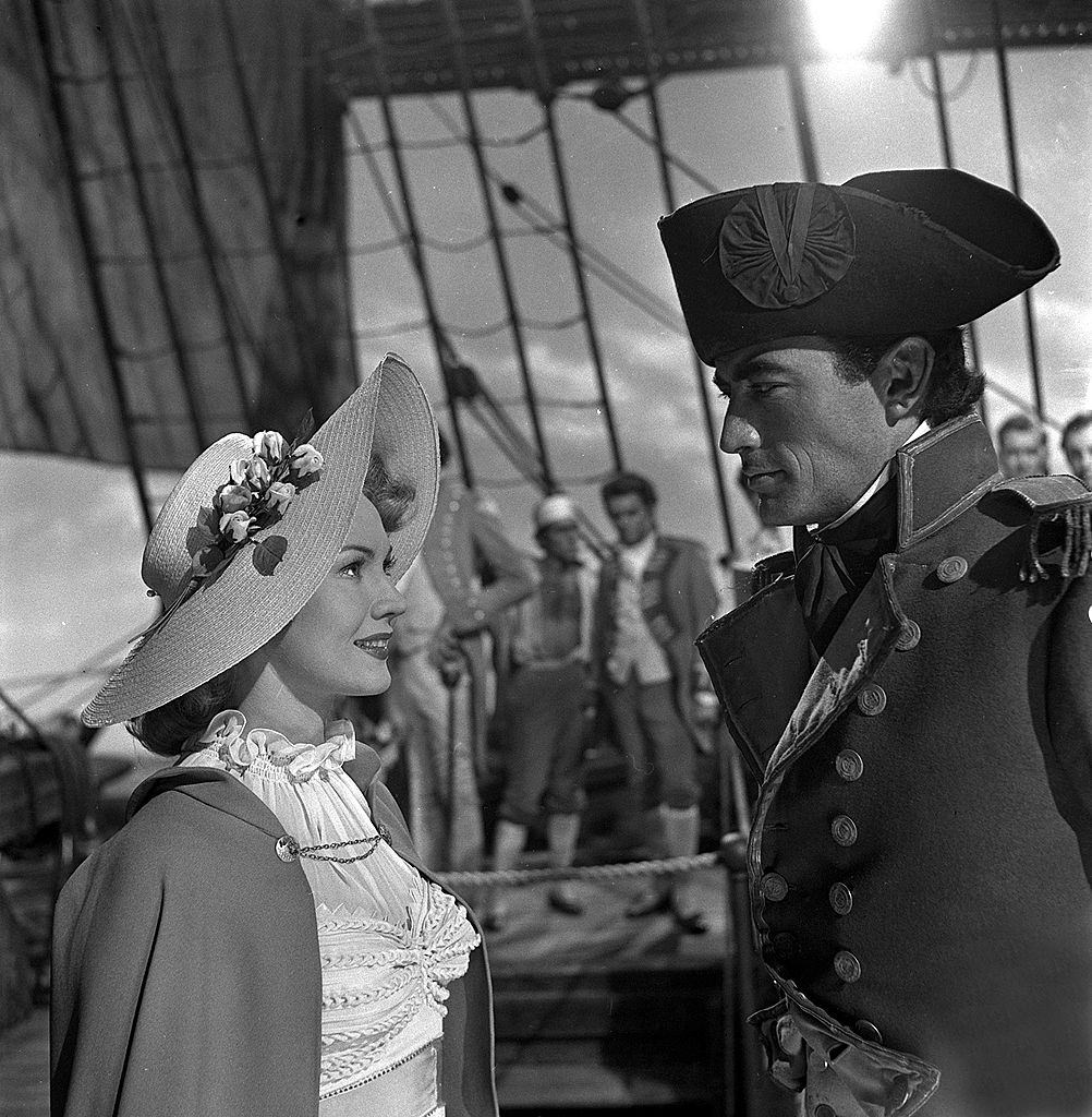 Virginia Mayo with Gregory Peck  during the making of the film "Captain Horatio Hornblower", 1950.