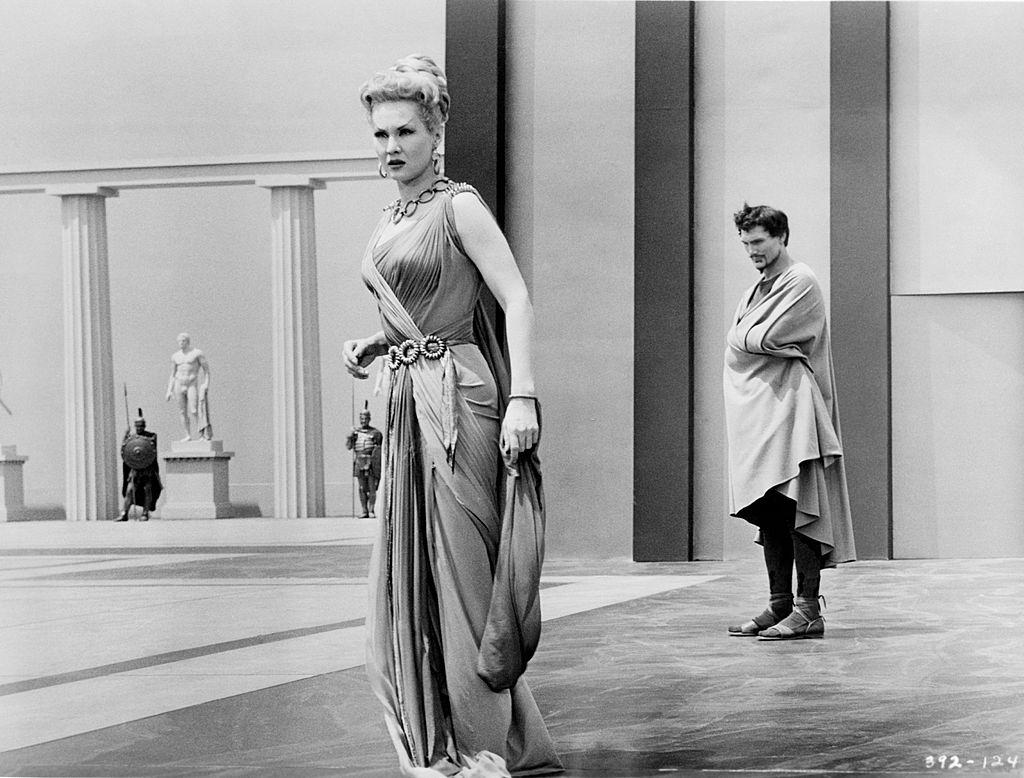 rginia Mayo and Jack Palance in typical ancient Greek dress in a scene from the movie 'The Silver Chalice', 1954.