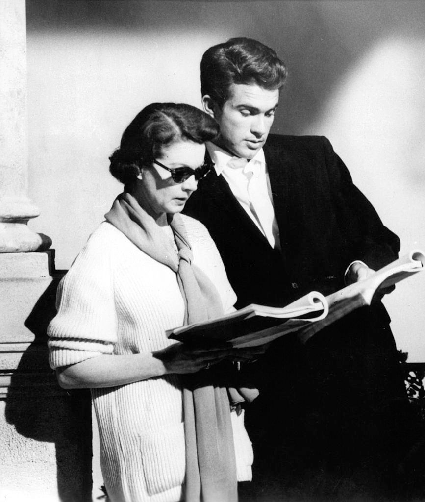 Vivien Leigh and Warren Beatty study their lines during a break from shooting the film 'The Roman Spring Of Mrs. Stone', 1961.