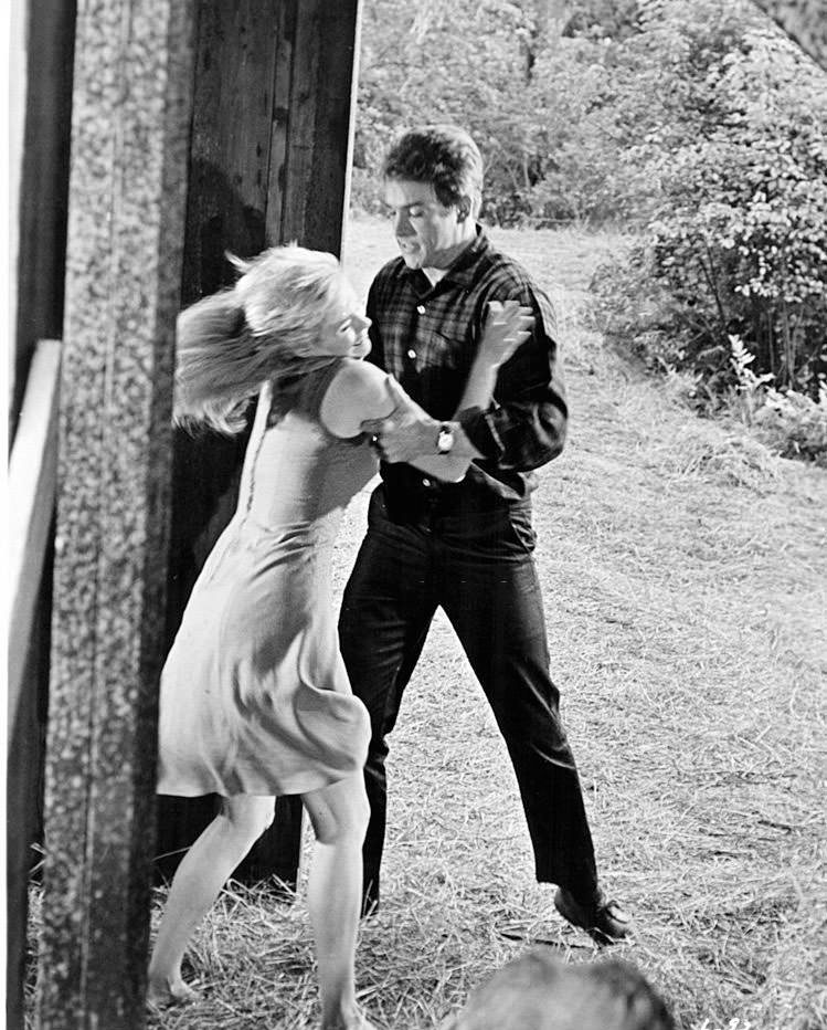 Jean Seberg struggles with Warren Beatty in a scene from the film 'Lilith', 1964.