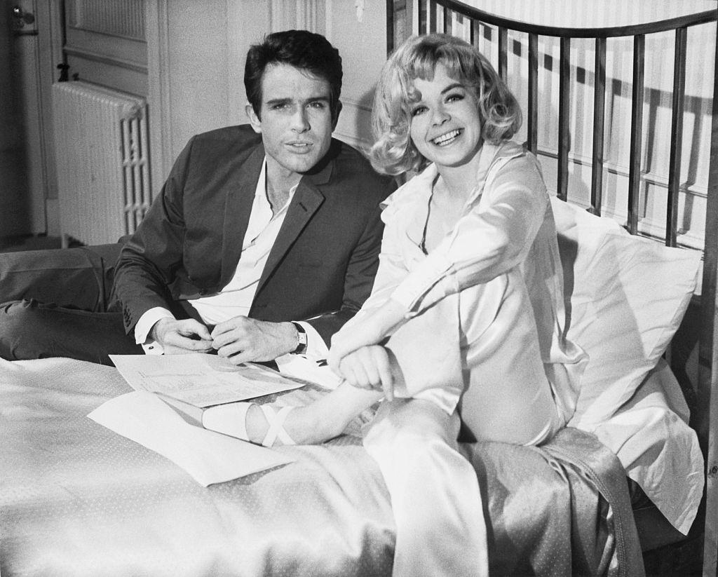 Warren Beatty and Susannah York go over lines on the set of the film Kaleidoscope. London, 1966.
