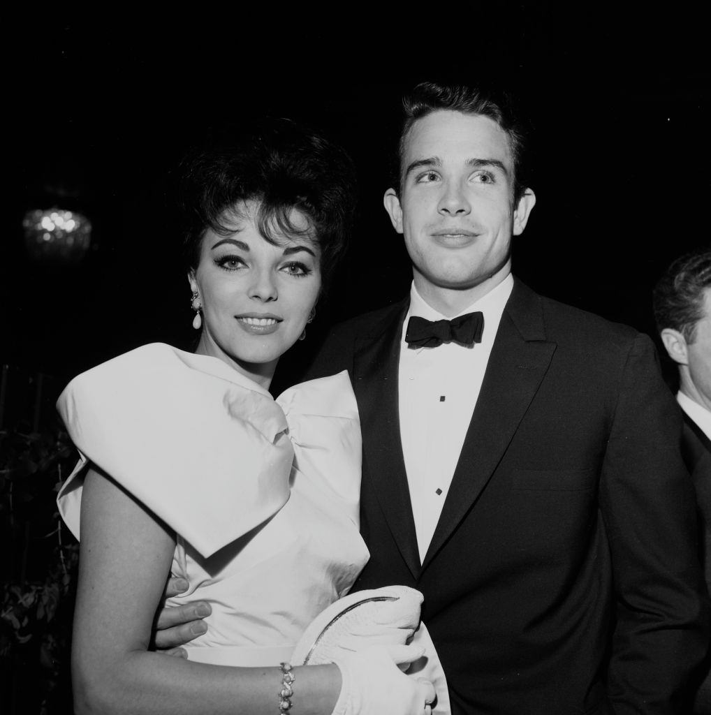 Warren Beatty and actress Joan Collins attend a party in Los Angeles, 1959.