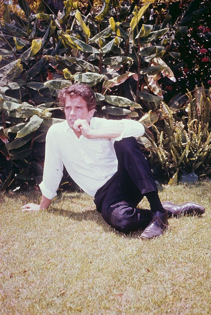 Warren Beatty relaxing in the garden, 1968.