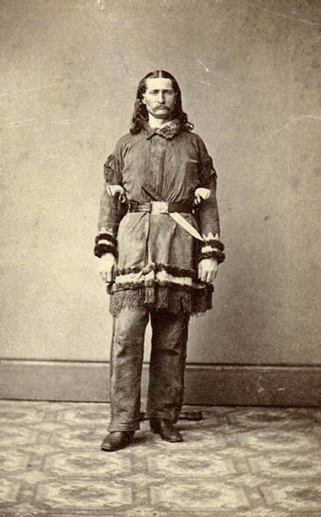 Wild Bill Hickok in 1869. The unsheathed knife is likely a photographer’s prop.