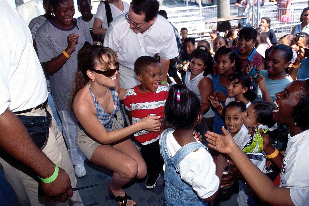 Mariah Carey with children, 1993.