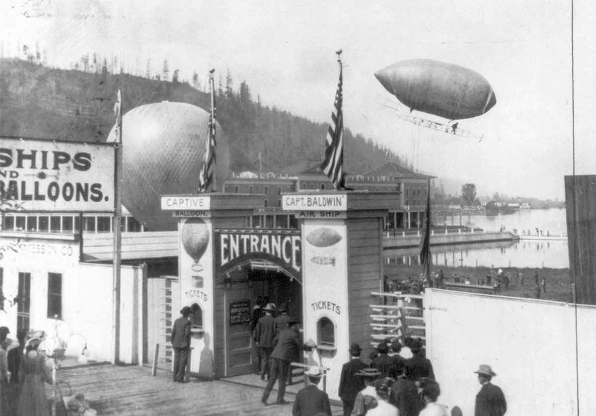 In 1905, pioneering balloonist Thomas Scott Baldwin’s latest airship returns from a flight over the City of Portland, Oregon, during the Lewis and Clark Centennial Exposition.