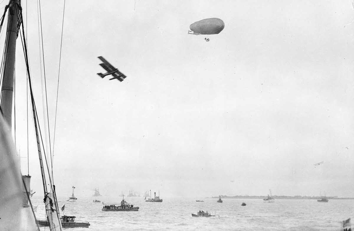 Boats, airplane, and airship, ca. 1922. Possibly the U.S. Navy’s SCDA O-1.