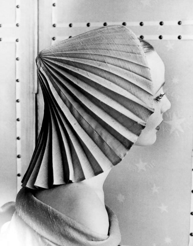 Model in pleated hat by Elsa Schiaparelli, photo by Regina Relang, Paris, 1951