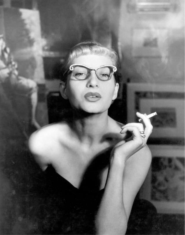 Gisela-Ebel-Penkert wearing butterfly glasses, photo by Regina Relang, 1950