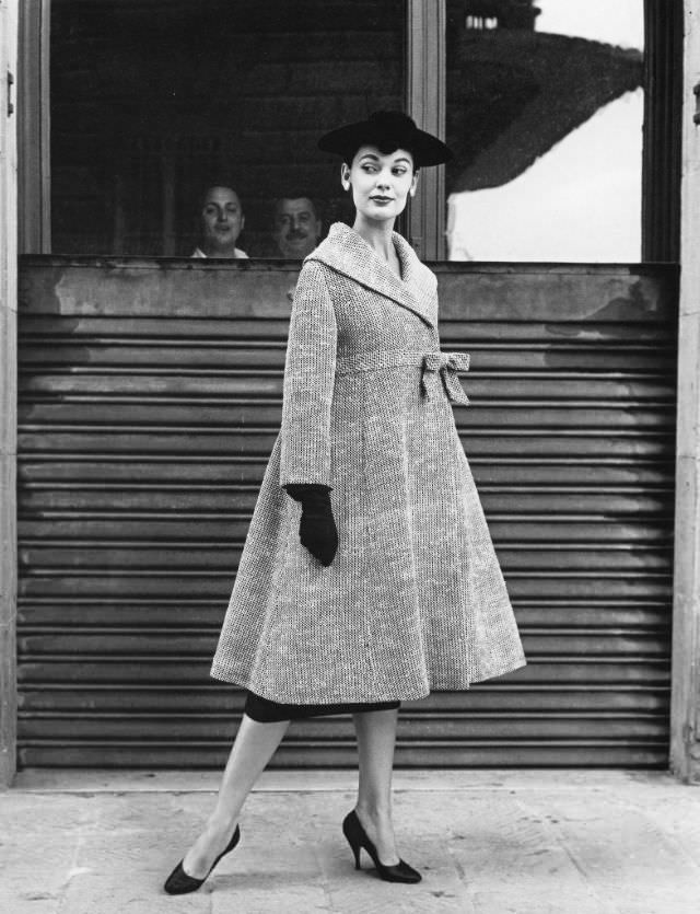 Joan Whelan is wearing a coat by Simonetta, photo by Regina Relang, Florence, Italy, 1955
