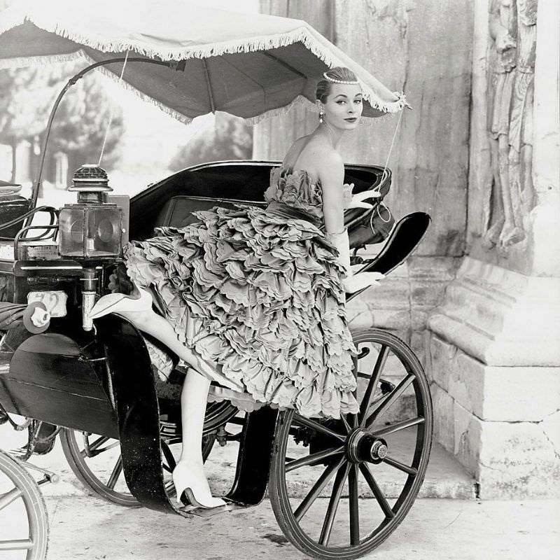 Model in full-skirted flounced petal-dress by Capucci, photo by Regina Relang, 1955